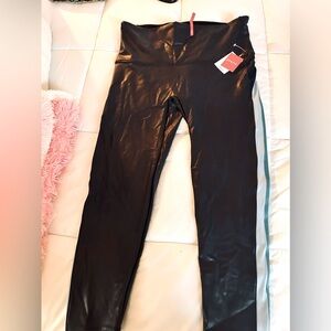 Navy blue Spanx leggings with three striped side detail. Brand new with tag. 2X.